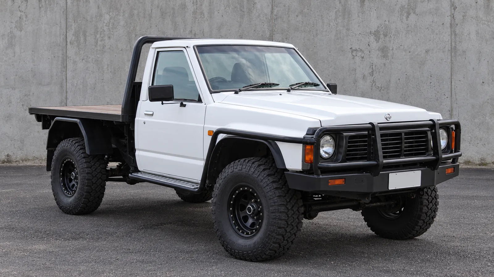 Nissan Patrol GQ Y60 Cab Chassis, Coil Front and Rear with a suspension lift